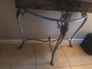An old wrought iron table