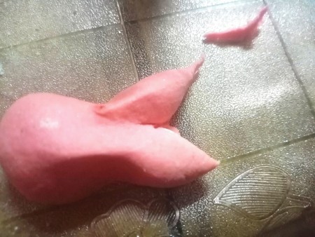 Mermaid Tail Cake Topper (Gumpaste) - cut out a V shape from the flattened end of the dough