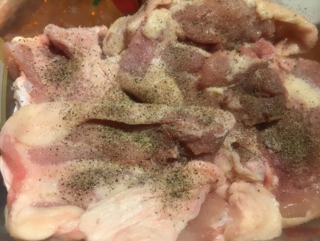 Chicken sprinkled with spices.