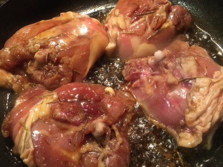 The chicken covered in marinade.