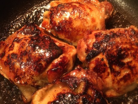 The cooked pomegranate rosemary chicken.