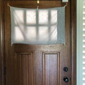 Hanging Window Door Covering - finished covering over the entry door window