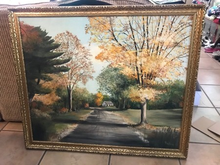 A painting of fall trees.