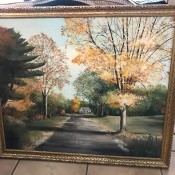 A painting of fall trees.