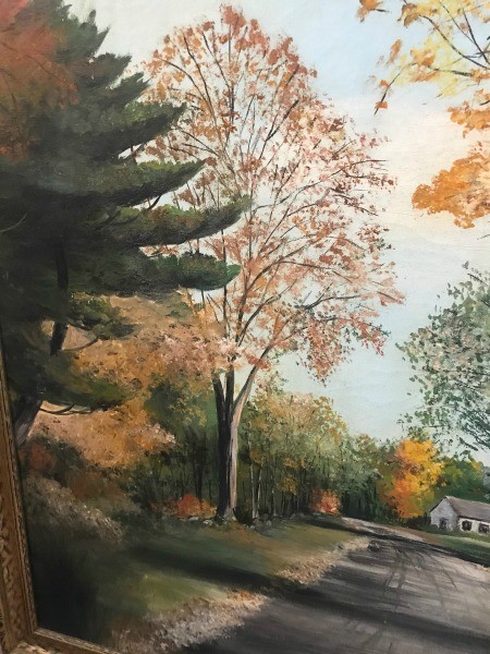 A painting of fall trees.