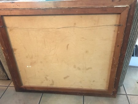 The back of the framed painting.