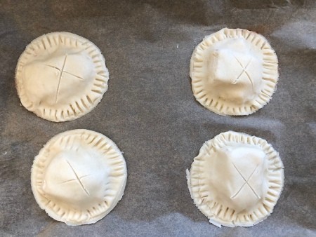 Apple and brie hand pies before baking.