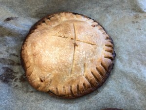 A baked apple and brie hand pie.