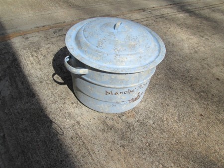 A large metal pot after being painted.