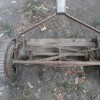 An old metal push mower.