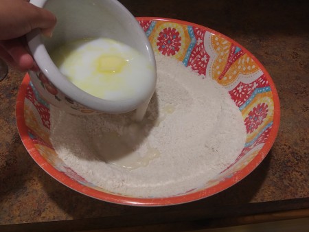 Adding the wet ingredients to the dry.