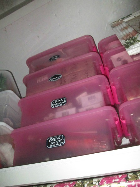Bright pink plastic containers with lids.