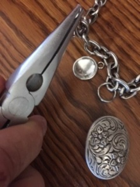 Ancestor Necklace - using pliers to attach the charms