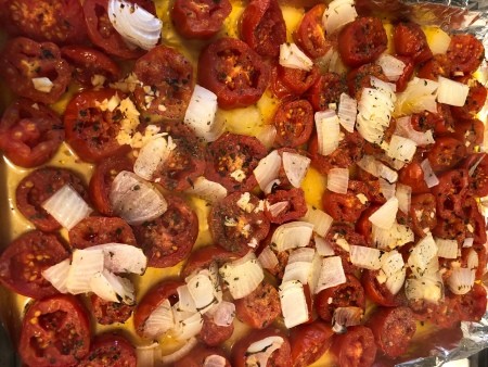 The cooked tomato and onions.