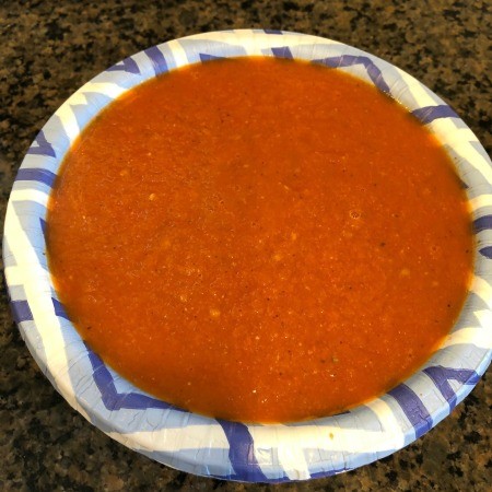 A bowl of simple tomato soup.