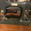 Value of a White Sewing Machine? - flat black rather plain sewing machine