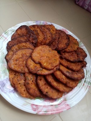 A plate of squash sardine pancakes.