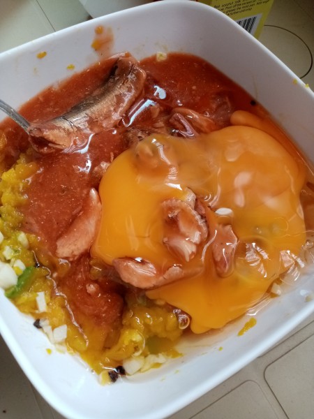 Combining the squash with the can of sardines.