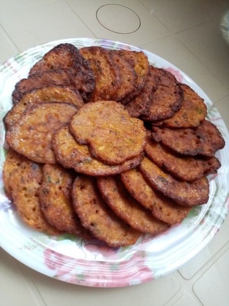 A plate of squash sardine pancakes.