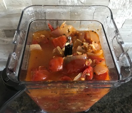 Adding ingredients to the blender.