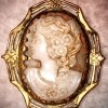 The front of a Victorian cameo brooch.