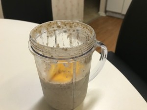 A blender cup filled with chia seed pudding.