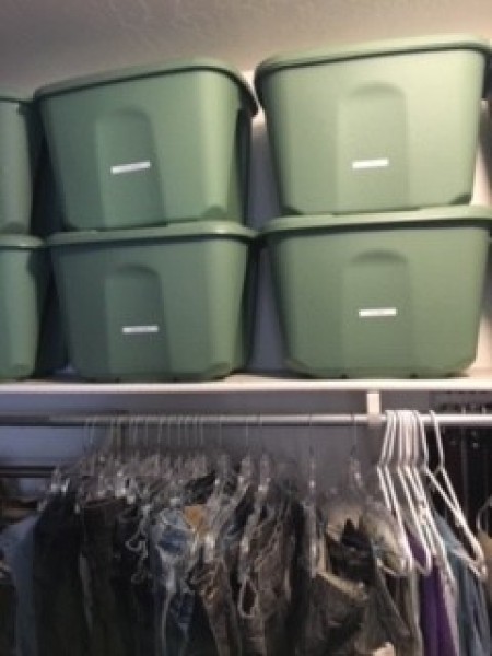 Storage bins on a shelf.