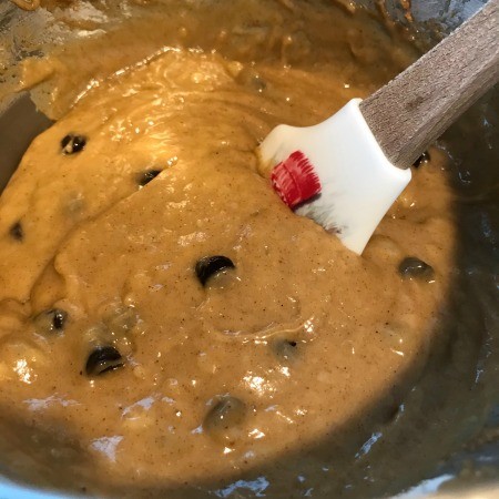 Mixing the batter for almond butter chocolate chip bread.