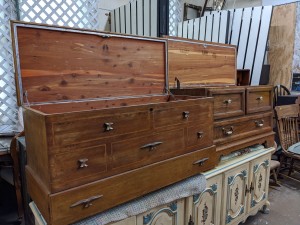 Two cedar chests with the lids open.