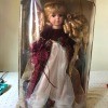 Value of a Collector's Choice Porcelain Doll? - angel doll in box