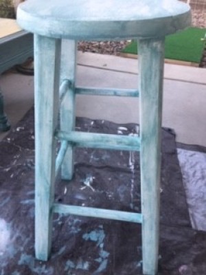 Distressed Finish Stool - wooden stool with a light blue distressed wash finish