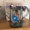 Topiary Watering Can Bird's Nest Decor - finished piece with faux bird and flowers attached