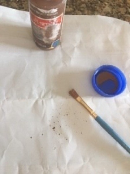 Topiary Watering Can Bird's Nest Decor - paint and brush for flicking spots onto the eggs