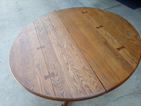 Top of a round oak table.