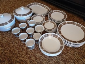 Set of china with a brown design.