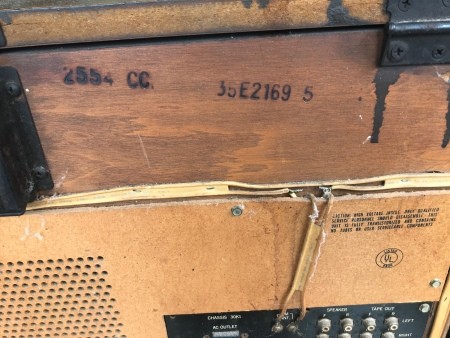Serial numbers on the back of a phonograph.