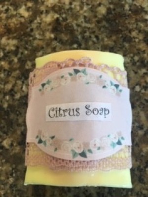 Citrus and Floral Homemade Soap - finished bar of soap with lace and sticker label