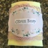 Citrus and Floral Homemade Soap - finished bar of soap with lace and sticker label