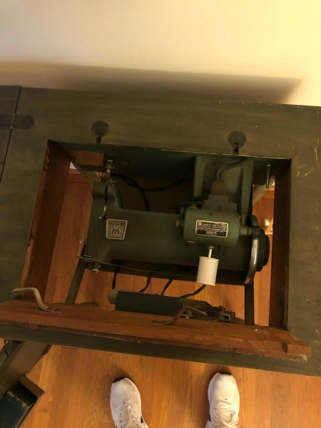 A White sewing machine table