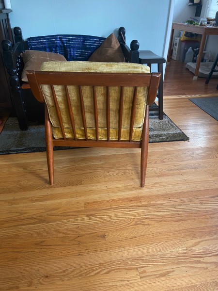The back of a wooden chair.