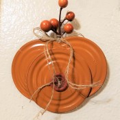 Lid Pumpkin Wall Hanging - finished pumpkin decor with faux sprig  and button glued in place