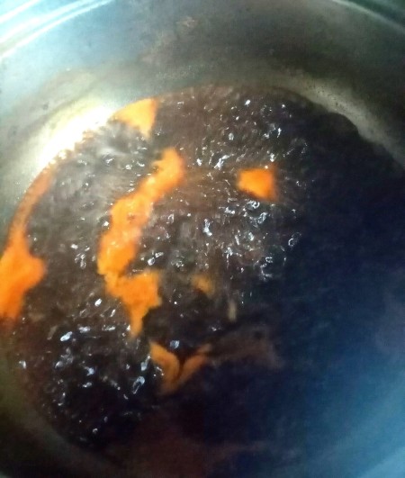 Mixing up the barbecue sauce.