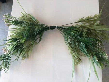 Swag Decoration For Less - arch shape made and flowers and grass fluffed up