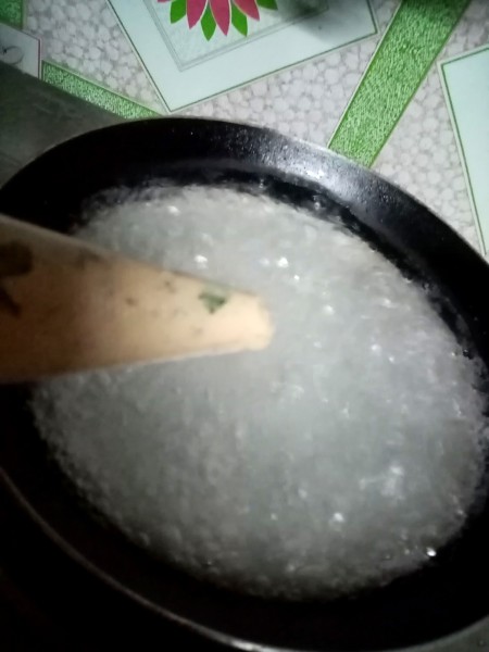 A frying pan full of boiling water.