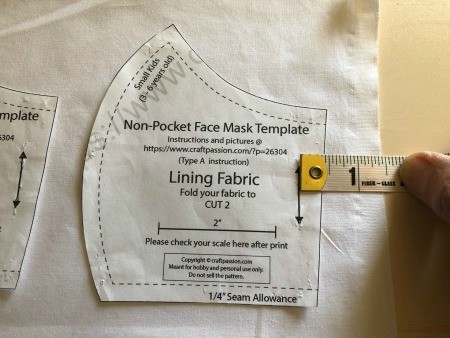 Non Pleated Child's Mask - measuring for placement on straight grain of fabric