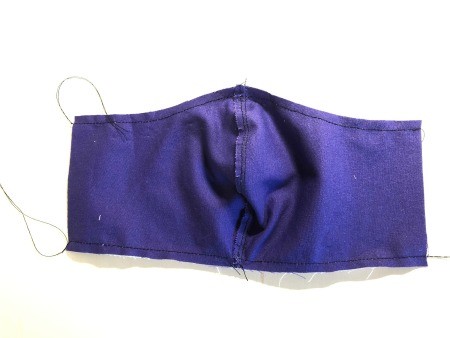 Non Pleated Child's Mask - wrong side of solid purple mask before turning