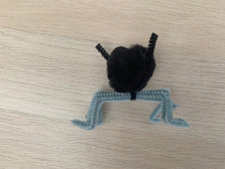 Pom Pom Spider - tie the pom pom to the legs using the pipe cleaner