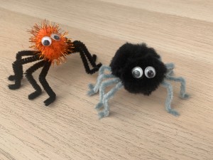 Pom Pom Spider - two spiders, one orange sparkly and one black