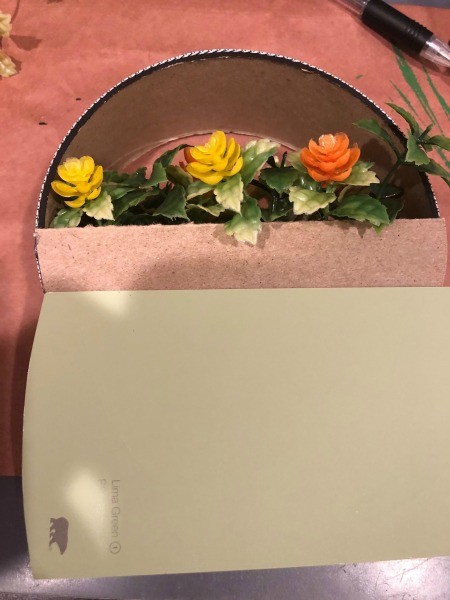 Circle Faux Flower Planter - cut a matching half circle from colored paint chip or other paper and glue in place