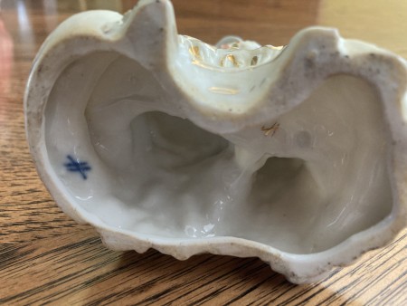 The bottom of a figurine.